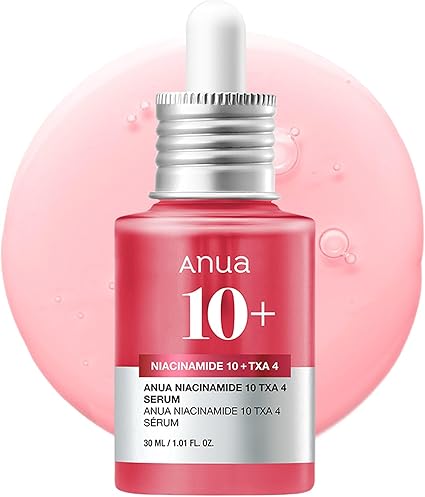 Anua 10+ serum bottle with dropper on a white background